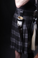 black leather belt with metal buckle