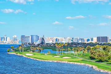 Dubai Golf and Yacht club with its green and lush golfcourse at the Dubai Creek