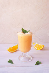 orange smoothie, milkshake with orange and mint