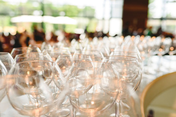 Group of empty and clean drink glasses ready for a party.