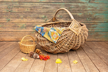 Fototapeta na wymiar Two wicker baskets small and large one. Hike for mushrooms in the forest. Autumn concept.