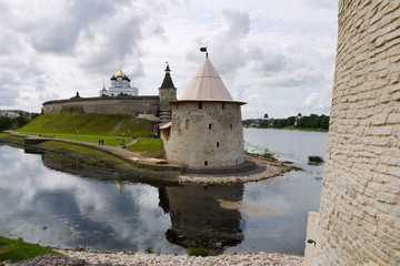 Medieval fortress at the confluence of the rivers. The stone tower guards the river bed. High...