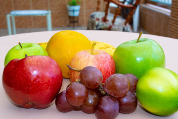Group of colorful fruits on top of garden table