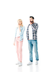 shocked girl and man looking away and covering mouths On White