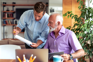 Two businessmen working together