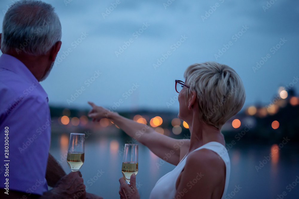 Wall mural senior couple enjoy the night