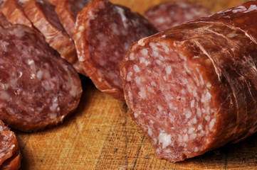 Sausage on a wooden board isolated on a white background.Food