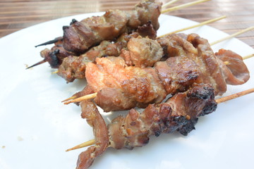 cooked pork skewer in bamboo stick