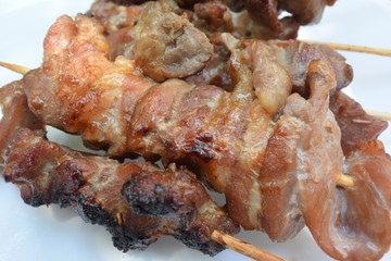cooked pork skewer in bamboo stick