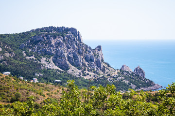 Black Sea view from the mountain. Light sunny summer day, Crimea, Russia.