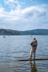 People fishing at the Lake Ashi in Hakone city, Kanagawa prefecture, Japan