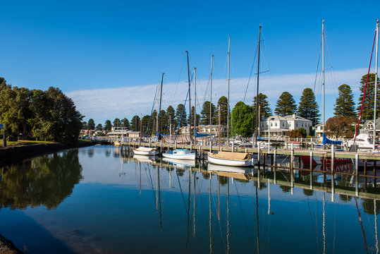 View of moored boats on Moyne River Port Fairy Victoria Australia