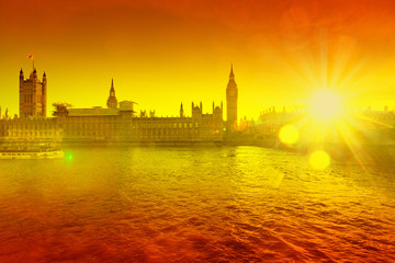 big ben against orange sunny background - heat wave in the UK - obrazy, fototapety, plakaty