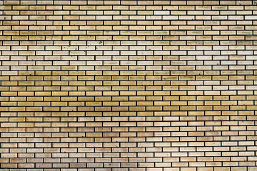 Beige brick wall abstract background. Blocks textured outdoor horizontal backdrop