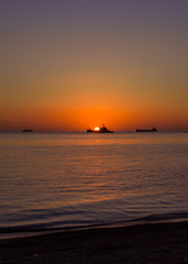 Naklejka na ściany i meble sunset at the sea lae lae island makassar indonesia