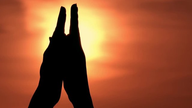 Close Up Female Hands Clap Their Hands On The Background The Sunset Sky With Sun