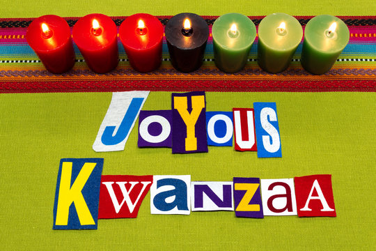 JOYOUS KWANZAA Text Word Collage Typography, Seven Candles And Multi Colored Fabric On Green Woven Fabric, African American Holiday, Horizontal Aspect