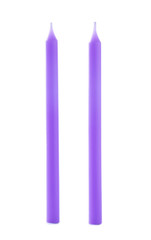 Thin purple birthday candles isolated on white