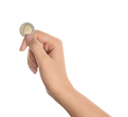 Young woman holding coin isolated on white, closeup