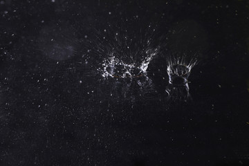 Splash of water on dark background. Rainy weather