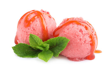 Scoops of delicious strawberry ice cream with mint and syrup on white background