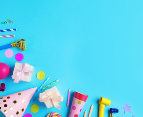 Flat lay composition with different birthday party items on light blue background, space for text
