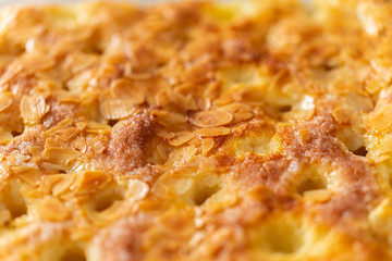 A delicious piece of fine cake with fruits on top