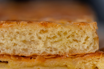 A delicious piece of fine cake with fruits on top