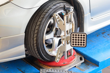 Car Wheel Alignment in tire garage service 
