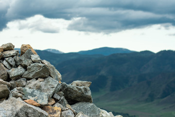 stones close up on a background of mountains
