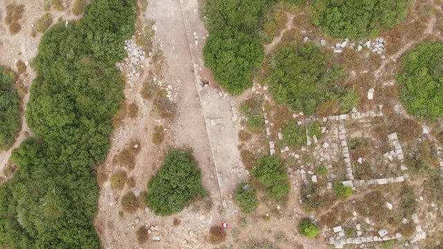 The ruins of the late Hellenic Jewish settlement Hurvat Sumak on Mount Carmel, Israel. View from the drone.
