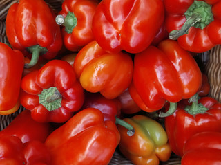 Red pepper close up. Fresh vegetable and fruit in a drawer in the store.