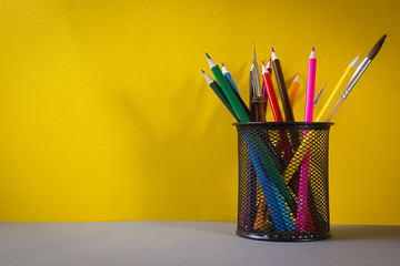 Multicolored pencils in the stand