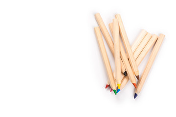 Obraz premium Wooden colorful ordinary pencils isolated on a white background