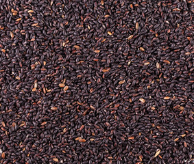 The raw black rice as background