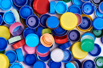 Stack of colored bottle tops