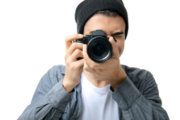 Fototapeta premium Male photographer on white background