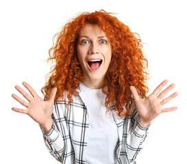 Screaming redhead woman on white background