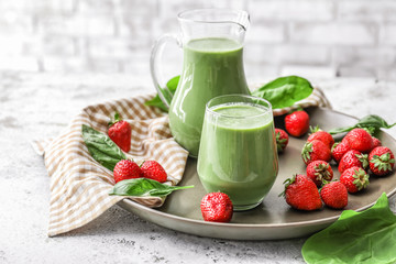 Composition with healthy smoothie on table
