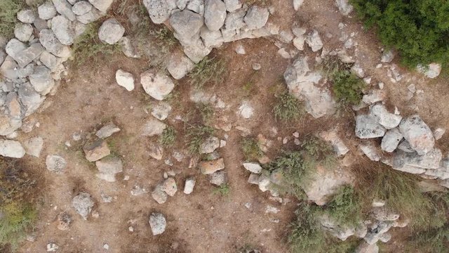 The ruins of the late Hellenic Jewish settlement Hurvat Sumak on Mount Carmel, Israel. View from the drone.