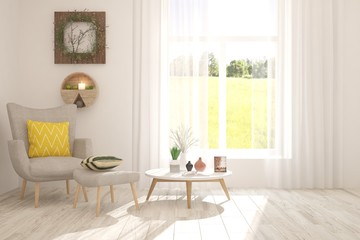 Mock up of stylish room in white color with armchair and green landscape in window. Scandinavian interior design. 3D illustration