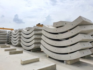 Precast concrete plant with blue sky in the construction site, in storage yard area at Thailand, Space for text in template, Concrete Tunnel Segments