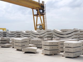Precast concrete plant with blue sky in the construction site, in storage yard area at Thailand, Space for text in template, Concrete Tunnel Segments