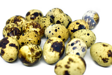 Obraz premium Quail eggs isolated on white background