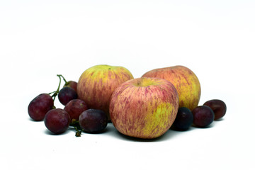 orange, grapes and apple group isolated on white background. Horizontal composition for package design