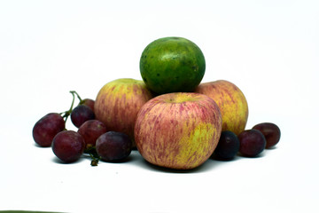 orange, grapes and apple group isolated on white background. Horizontal composition for package design