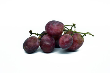 fresh red grapes isolated on a white background