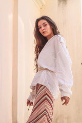 Young beautiful lady wearing a stylish white shirt.Portrait shooting of a stylish girl.Trends...
