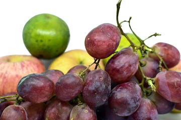 Closeup bunch of red grapes on white background