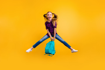 Full length photo of little pupil jump high finally holidays wear casual checkered shirt jeans denim isolated yellow background